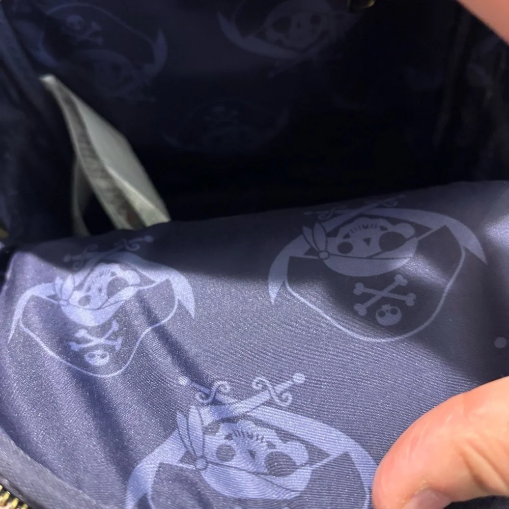 LOUNGEFLY DISNEY Mini Backpack with Pirates Of The Caribbean Cartoon Style Print - Picture 11 of 12